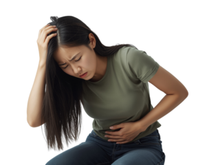 Distressed young woman clutching her stomach and temple experiencing pain isolated