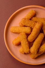 Mozzarella cheese sticks, crispy nutritious fast food. Cheese sticks as food background