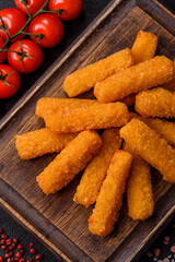 Mozzarella cheese sticks, crispy nutritious fast food. Cheese sticks as food background
