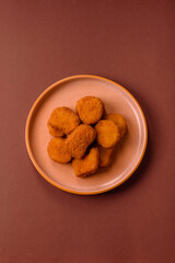 Chicken nugget with sauce, crispy nutritious fast food. Chicken nugget