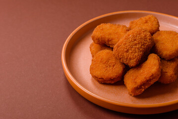 Chicken nugget with sauce, crispy nutritious fast food. Chicken nugget