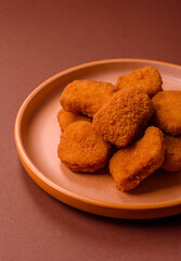 Chicken nugget with sauce, crispy nutritious fast food. Chicken nugget