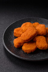 Chicken nugget with sauce, crispy nutritious fast food. Chicken nugget