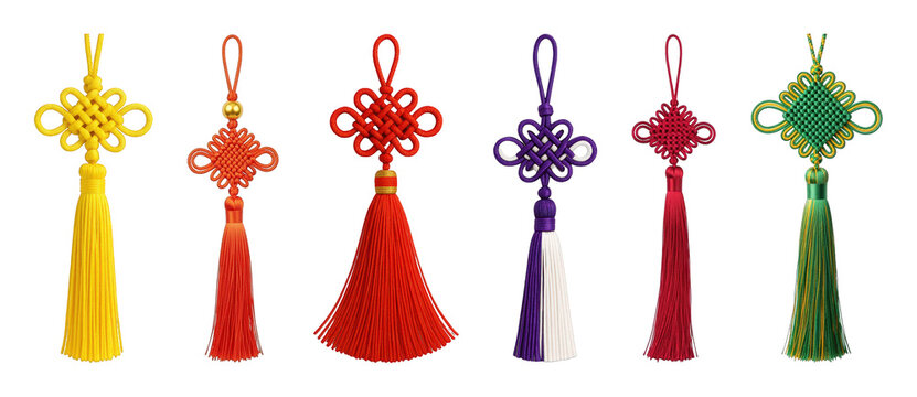 Chinese knot and tassel set including vibrant red, yellow, purple, and green designs isolated. Asian cultural decoration and good luck symbols.