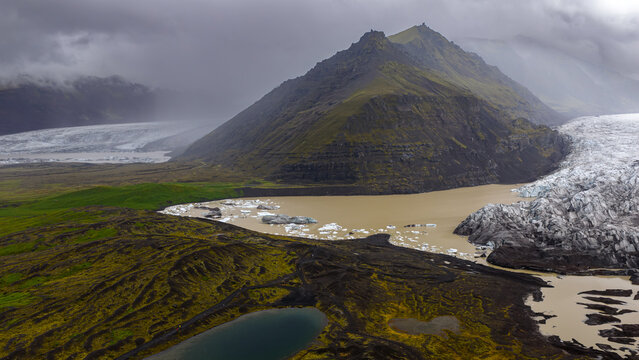 Aerial View of Icelandic Mountain, Glacier, and Glacial Lake