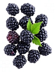 Fresh blackberries, plump and juicy, atop a white background