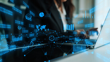 A business professional engages with a laptop in a contemporary office setting, surrounded by digital analytics overlays showcasing charts and graphs. Xenic