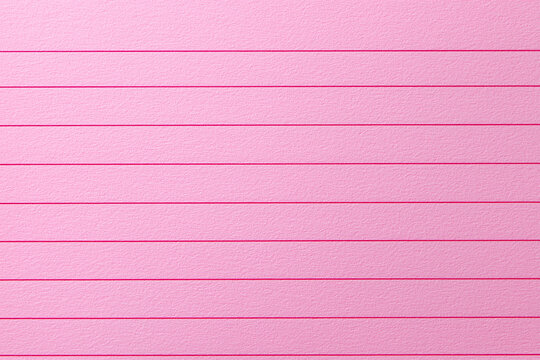 Pink lined notepad paper with horizontal lines for writing or note taking