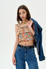 Fashion shooting in studio . Professional model , fashionable clothes and style, new collection. stylish look