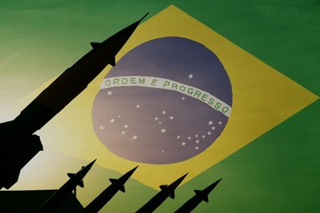 Missiles on a background of flag of Brazil. Copy space on the right side