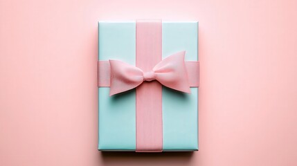 A beautifully wrapped gift box in pale blue with a soft pink ribbon, set against a pastel pink backdrop, Ideal for holiday promotions, birthday celebrations, or marketing for gifting services,