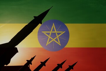 Rockets on a background of flag of Ethiopia. Copy space on the right side