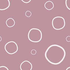 Seamless pattern consisting of circle. The symbols are made in white color on dull purple background