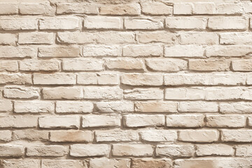 Fototapeta premium Cream colored brick wall texture background design element