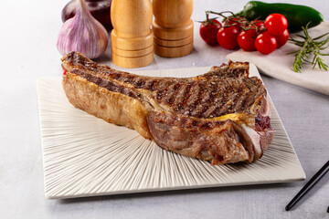 Grilled ribeye beef steak with bone