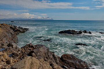 Russia. The Far East. The Kuril Islands. The picturesque rocky coast of Iturup Island in the Sea of Okhotsk.