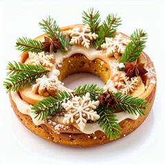 Festive holiday cake adorned with evergreen sprigs and snow decorations on white background