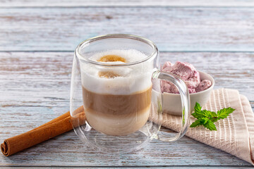 Hot cappuccino beverage in the glass