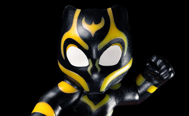 Naklejka premium Kinder Surprise Marvel Black Panther face on the black background