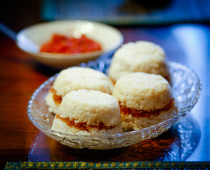 Puttu or steamed rice layered with coconut shavings.