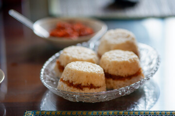 Puttu or steamed rice layered with coconut shavings.