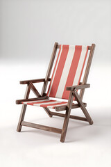 Folding beach chair with red and white striped seat.
