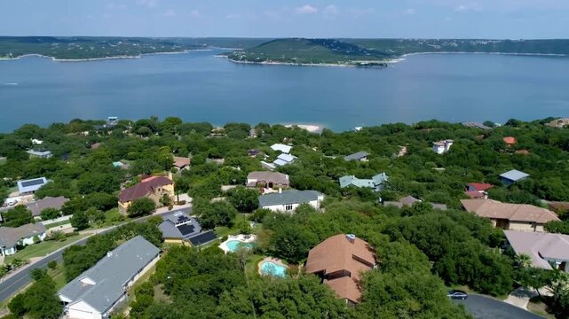 Aerial view of houses and trees near lake travis in austin, texas, usa