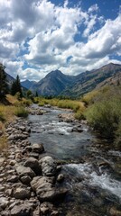 Naklejka premium River winds through mountains, cloudy sky