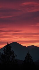 Sunset over serene mountain peaks