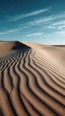 Waves of sand create patterns in desert landscape