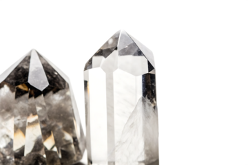 Clear and smoky quartz points isolated on a transparent background