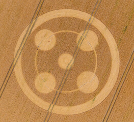Aerial view of a mysterious, intricate, geometric crop art, crop circle formation in a wheat field near Hackpen Hill, Wiltshire, England, UK 