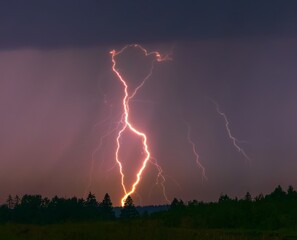 Lightning storm in the sky, lightning bolts in the storm clouds