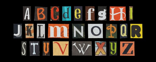 Halloween alphabet set, spooky cut-out letters collage on dark background © BORT GRAPHIC