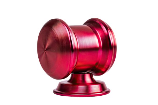 A vibrant crimson, metallic object resembling a double cylinder or spool, resting on a smaller, circular base.  The surface is highly polished and displays a brushed or machined texture