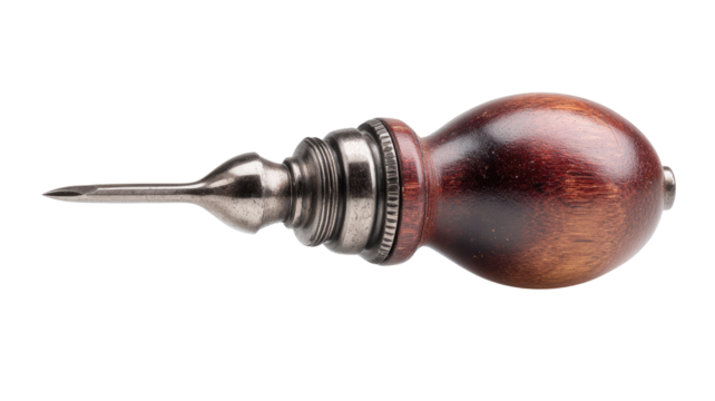 Close-up of a small, hand-held woodworking tool with a  dark-wood handle and a pointed metal tip