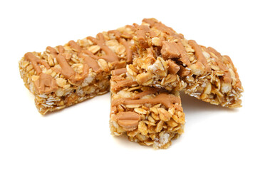 Honey bars with peanuts, sesame and sunflower seeds isolated