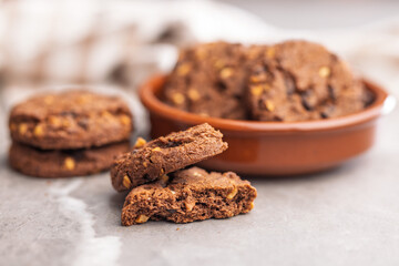 Sweet chocolate cookies on kitchen table.