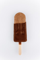 Bite taken chocolate ice cream bar on stick isolated on white background