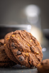 Sweet chocolate cookies on kitchen table.