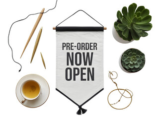 Flat lay of banner with text "PRE-ORDER NOW OPEN", placed on white background.
