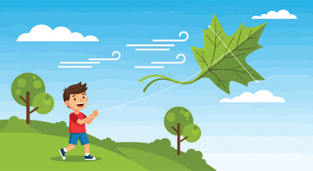 Happy young boy flying a large green leaf kite outdoors.