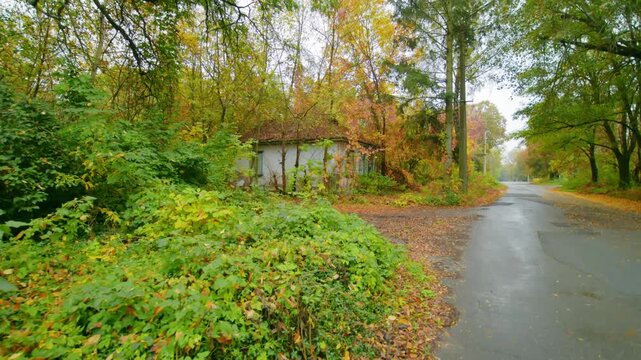 Footage of an abandoned building, identified as a former conscription point, located on Lenin Street within the Chernobyl Exclusion Zone.