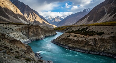Majestic River Flowing Through a Grand Mountain Valley Landscape.