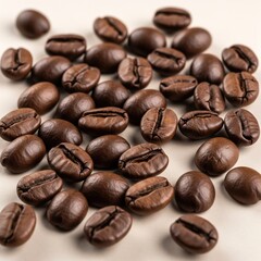 Aromatic coffee beans scattered on a light surface create a cozy and inviting atmosphere, perfect for coffee enthusiasts and culinary-themed visuals.
