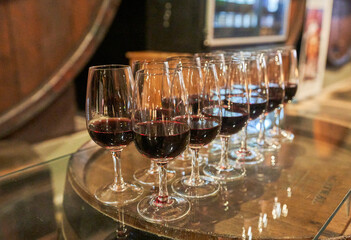 lose-up of sommelier serving  wine at fine dining restaurant
