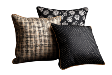 Three decorative pillows in black and beige with different patterns; stylish home decor. background removed
