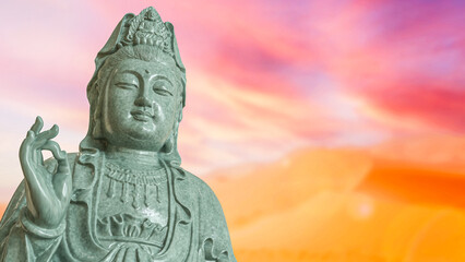 Obraz premium The Guan Yin sculpture for religion concept 3d Rendering.
