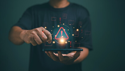 Man holding magnifying glass with glowing warning alert icons on smartphone. System error notification, data security breach. Cyber risk prevention technology. Concept for cybersecurity awareness.