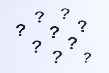 Question Marks Floating on White Background Depicting Confusion, Inquiry, Uncertainty, and Seeking Answers